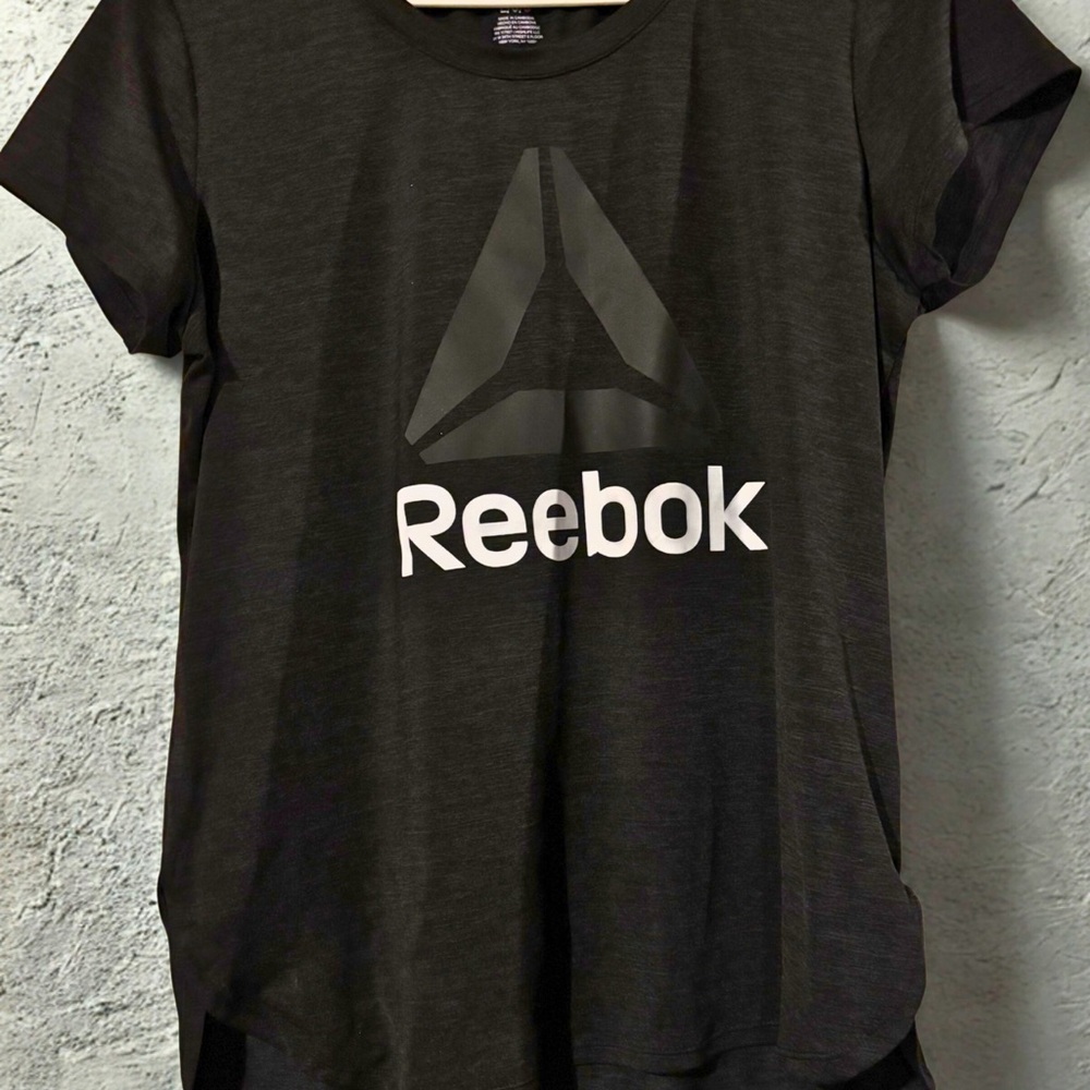 Reebok Athletic Shirt, Brand new condition.